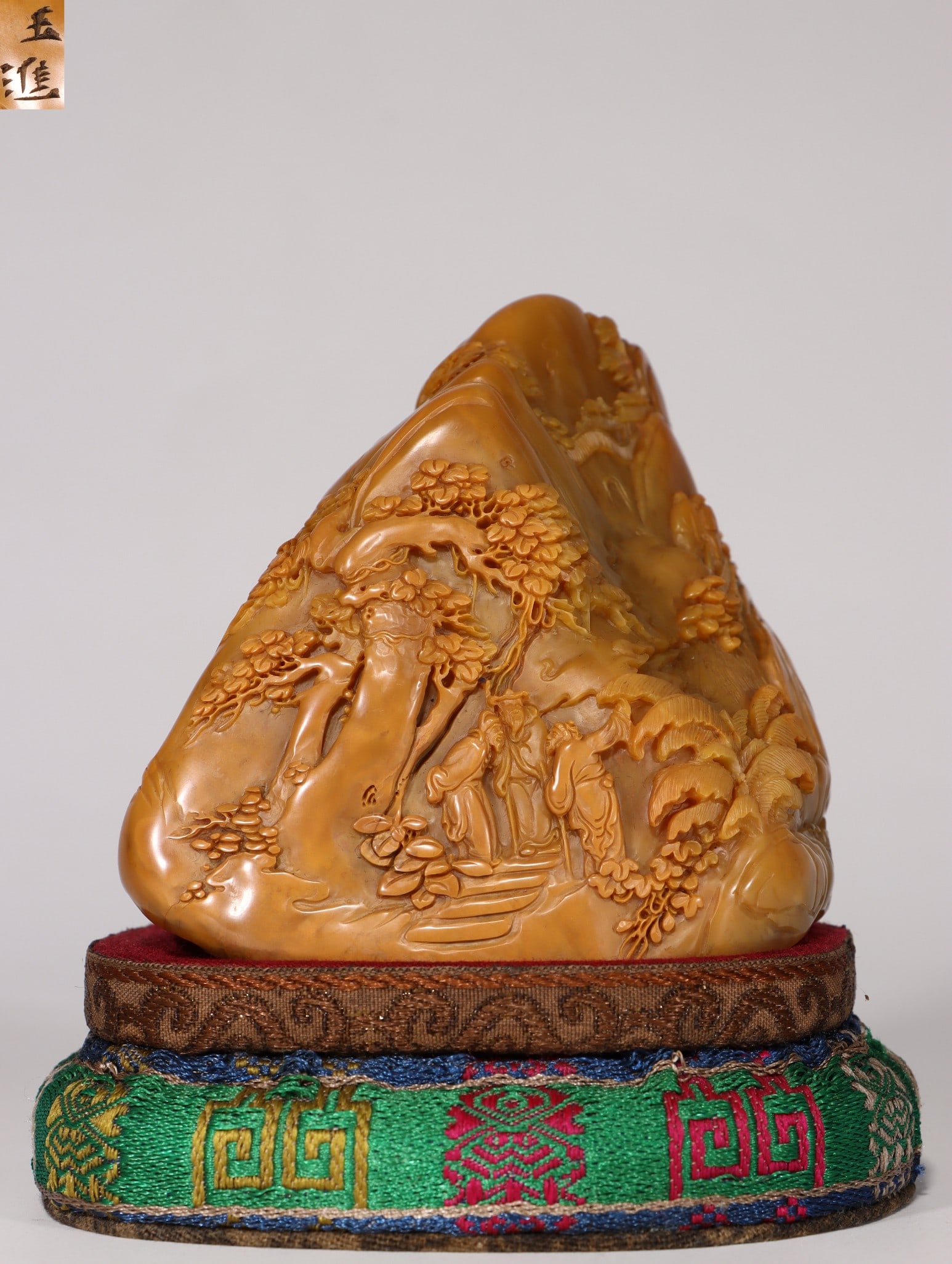 A Shoushan Stone Mountain Carving: A Shoushan Stone Mountain Carving. Height: 3.54"; Length: 3.35"; Width: 2.95". Weight: 1.49lbs.