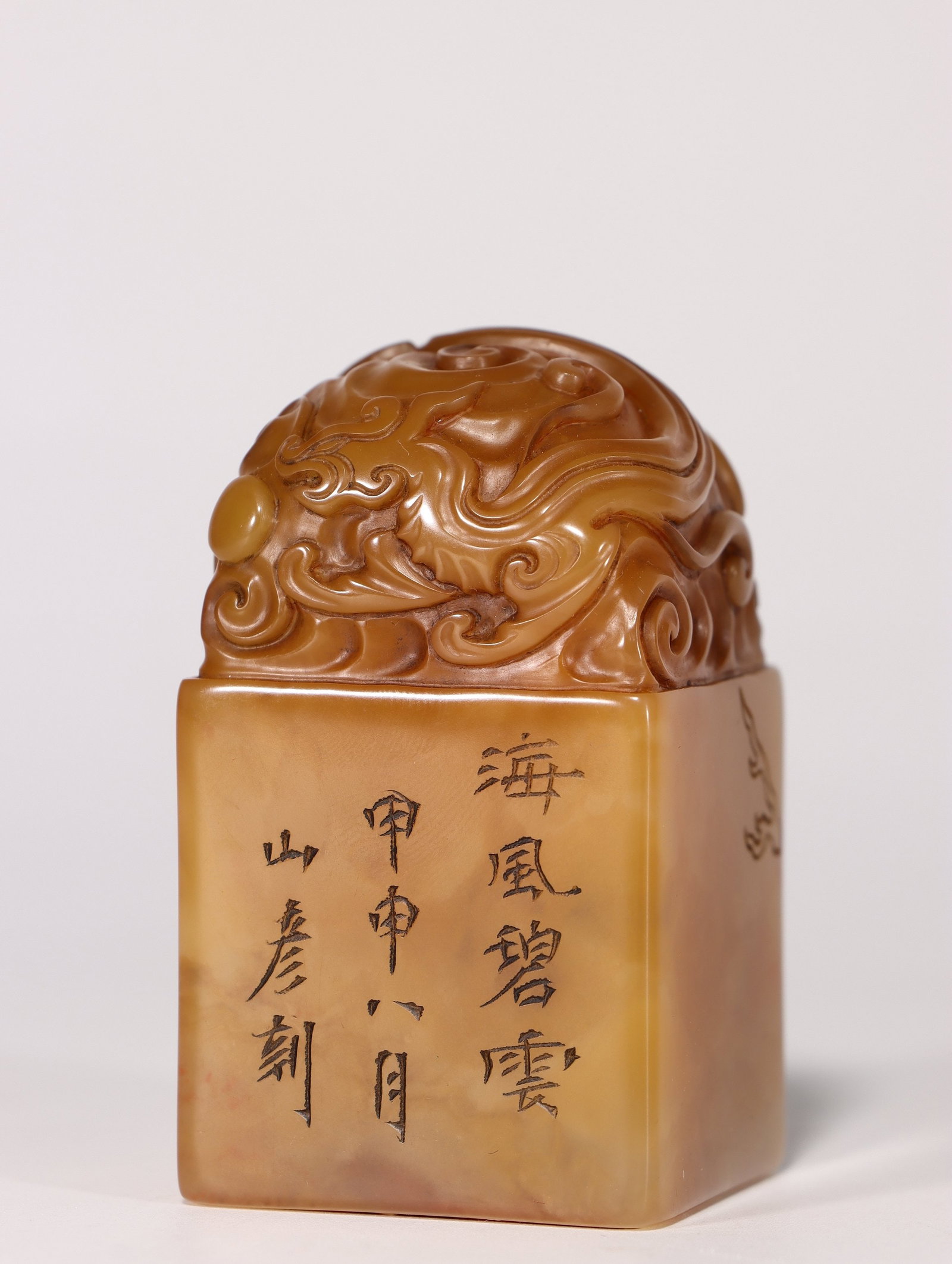 A Shoushan Stone Seal: A Shoushan Stone Seal. Height: 2.36"; Length: 1.34"; Width: 1.34". Weight: 0.35lbs.