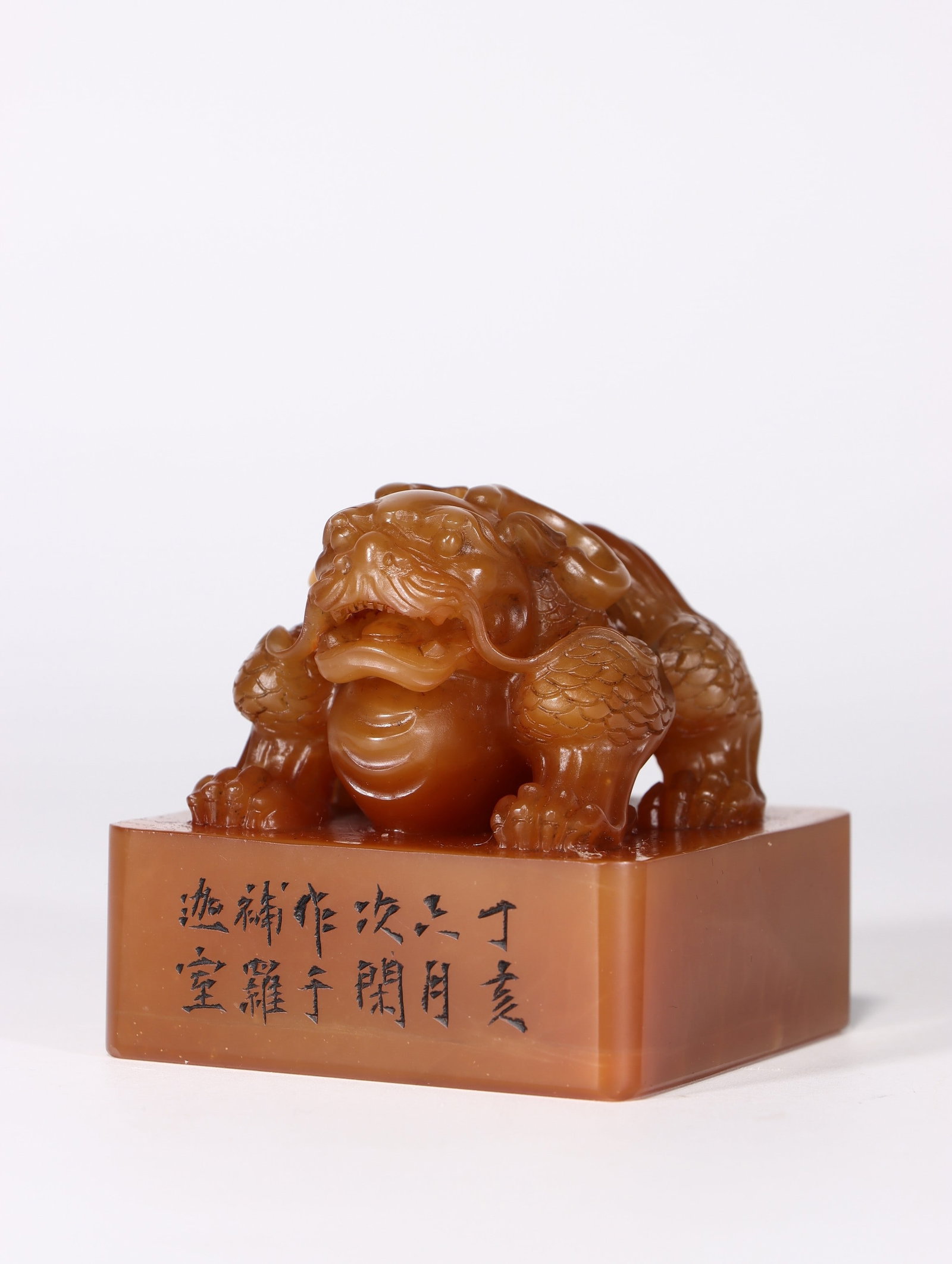 A Shoushan Stone Seal: A Shoushan Stone Seal. Height: 2.17"; Length: 2.05"; Width: 2.05". Weight: 0.67lbs.