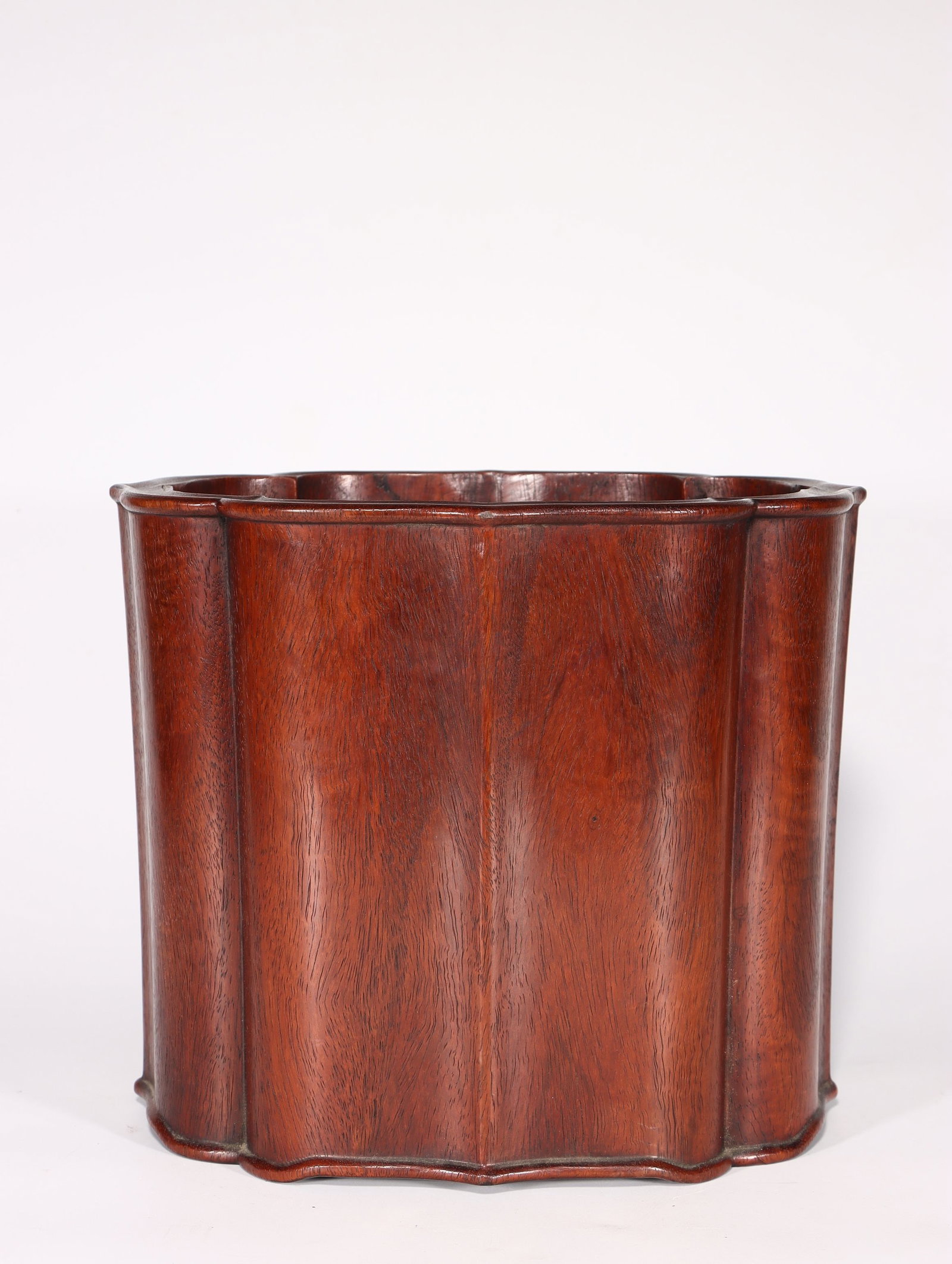 A Huanghuali Brushpot: A Huanghuali Brushpot. Height: 8.27"; Length: 9.84"; Width: 8.27". Weight: 5.40lbs.