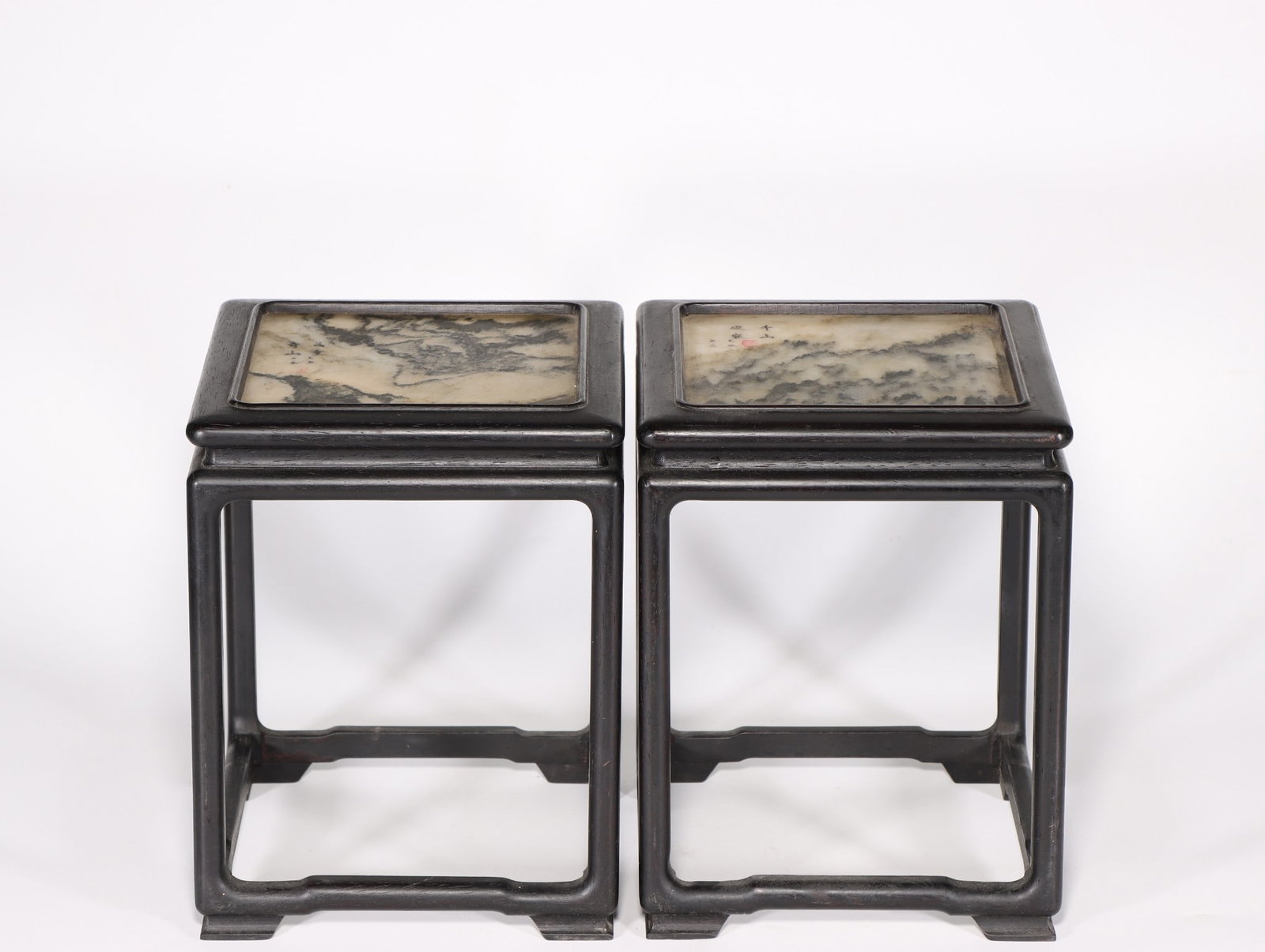 A Pair of Rosewood Stands: A Pair of Rosewood Stands. Height: 8.66"; Length: 6.69"; Width: 6.69". Weight: 1.57lbs.