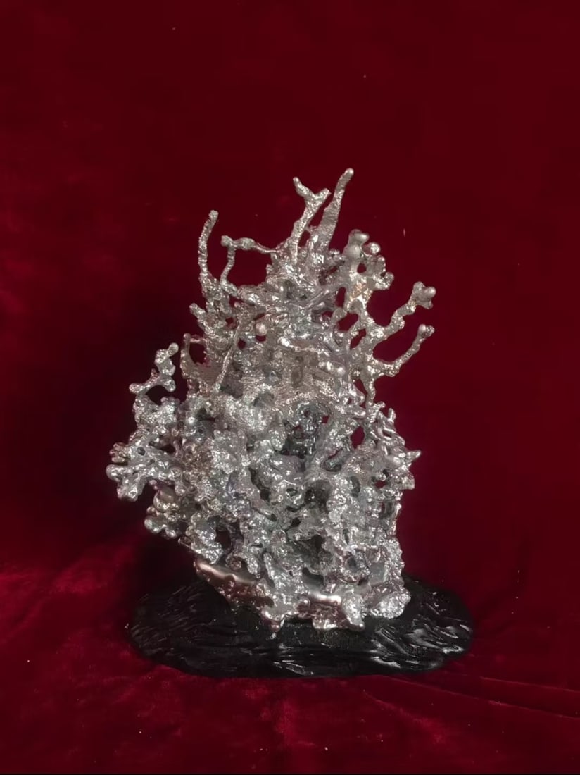 An Aluminum Sculpture: An Aluminum Sculpture. Height: 11.42"; Length: 9.06"; Width: 5.91". Weight: 4.41lbs.