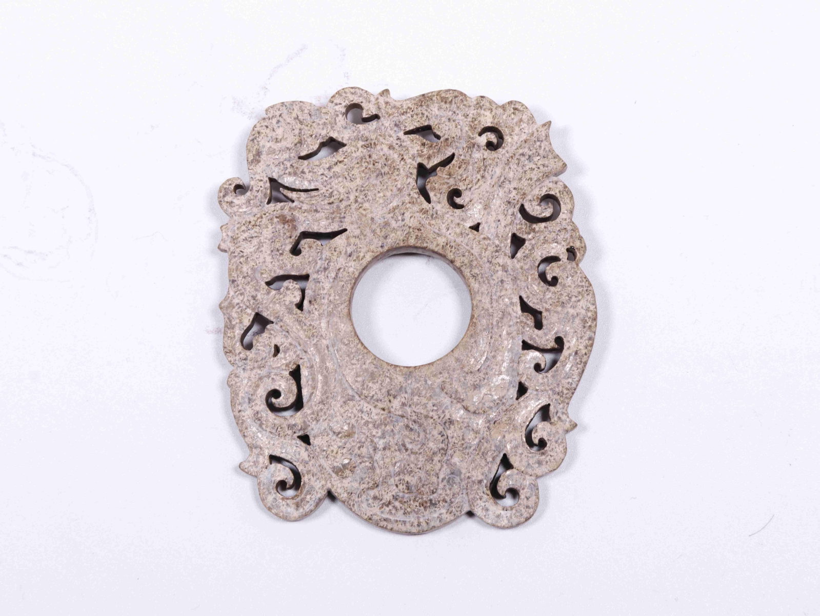A Jade Pendant: A Jade Pendant. Dimensions: 3.15" x 2.68" x 0.24".