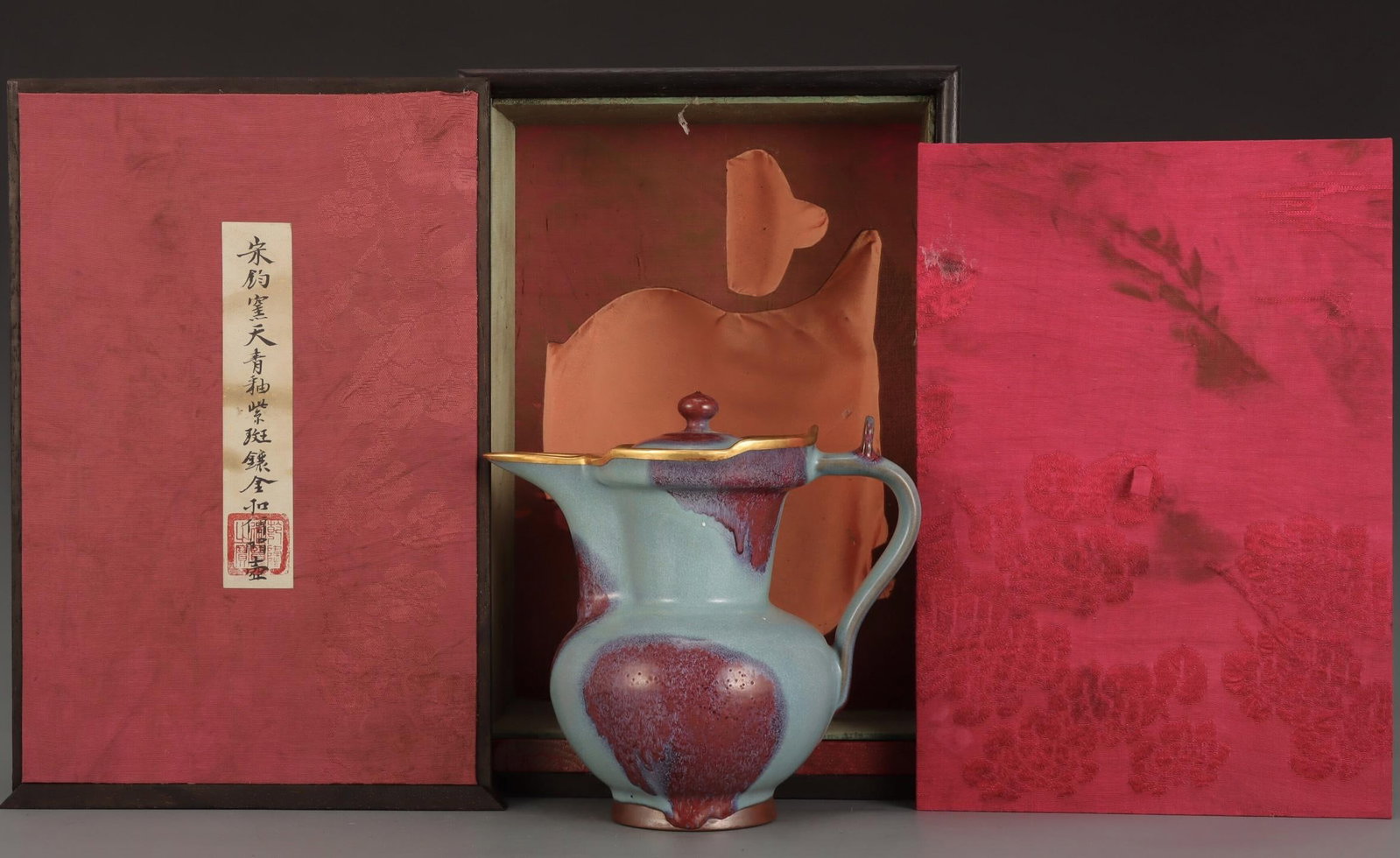 A Jun Ware Purple Splashed Monk?s Cap Ewer: A Jun Ware Purple Splashed Monk’s Cap Ewer. Height: 7.80" Diameter: 8.27"