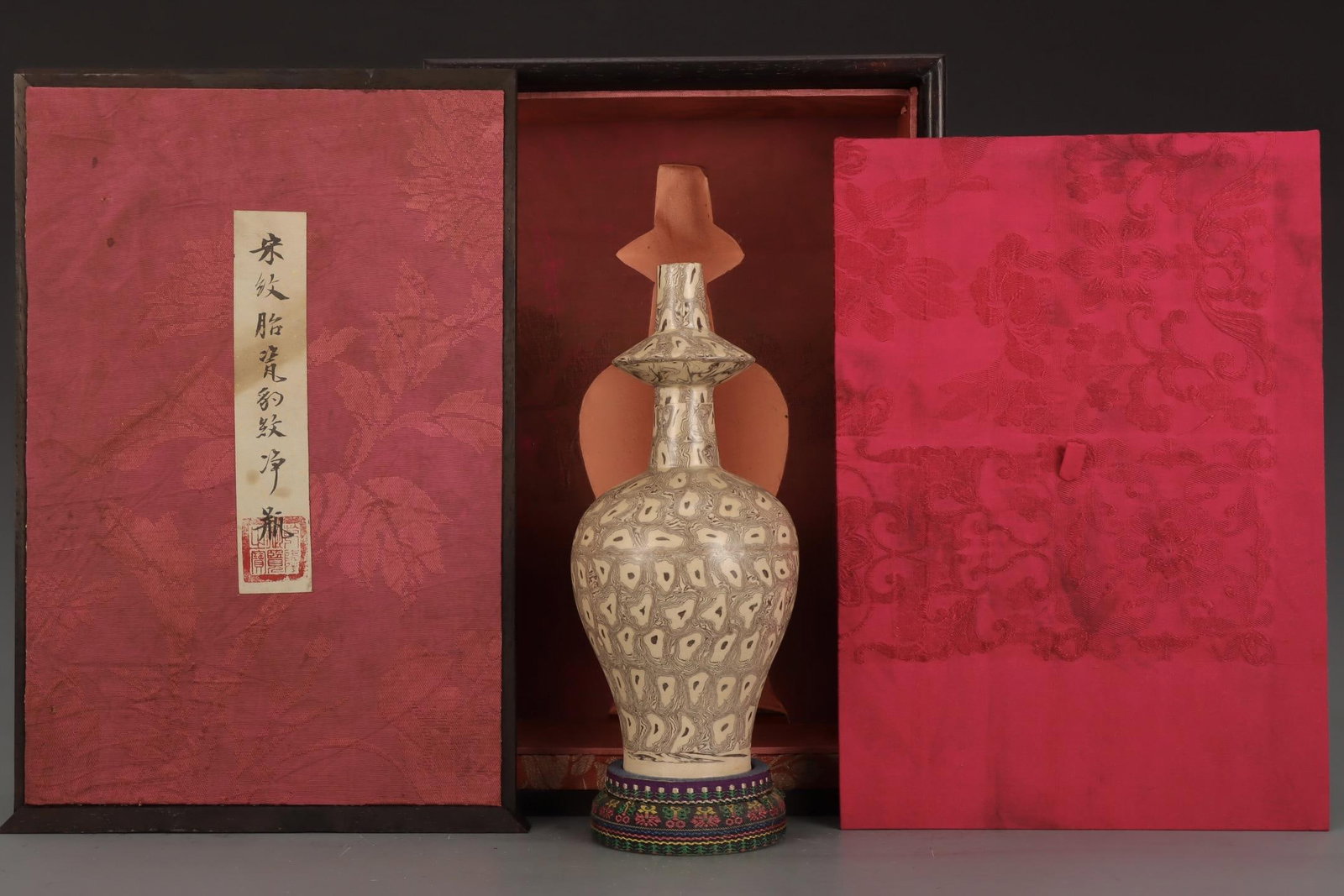 A Striated Ware Bottle Vase: A Striated Ware Bottle Vase. Height: 8.94" Width: 4.17"