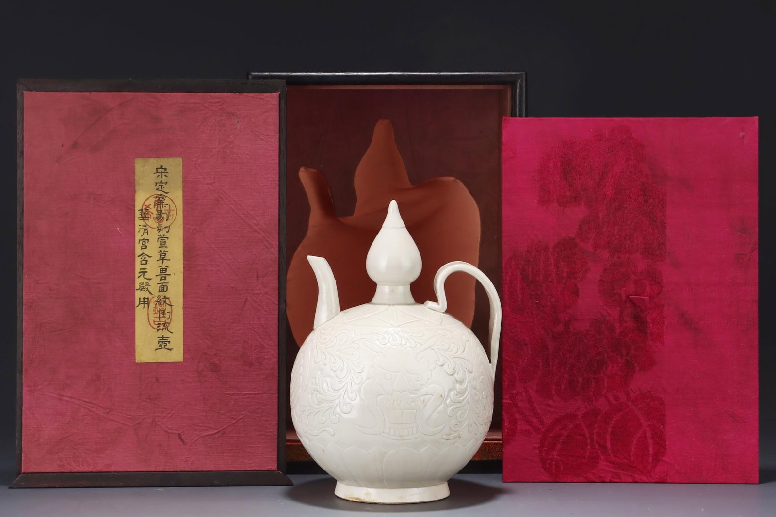 A Ding Ware Carved Ewer: A Ding Ware Carved Ewer. Height: 9.76" Width: 6.89"