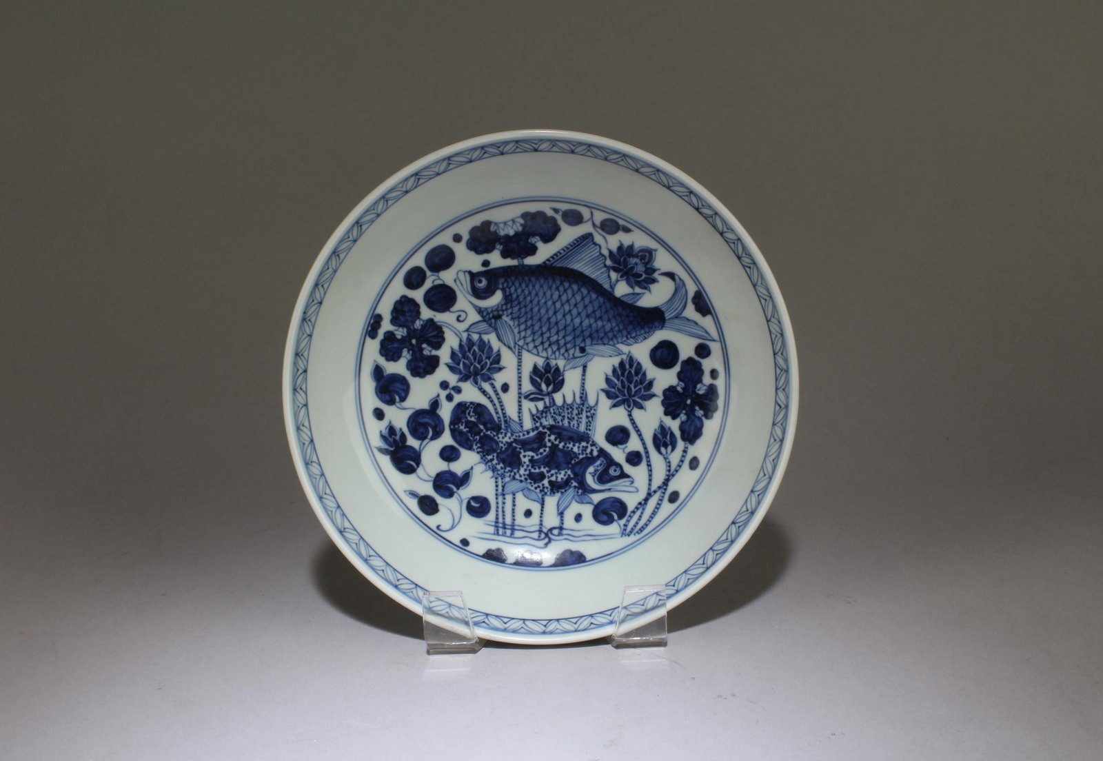 A Chinese Blue and White Porcelain Dish: A Chinese Blue and White Porcelain Dish. Diameter: 7.5"