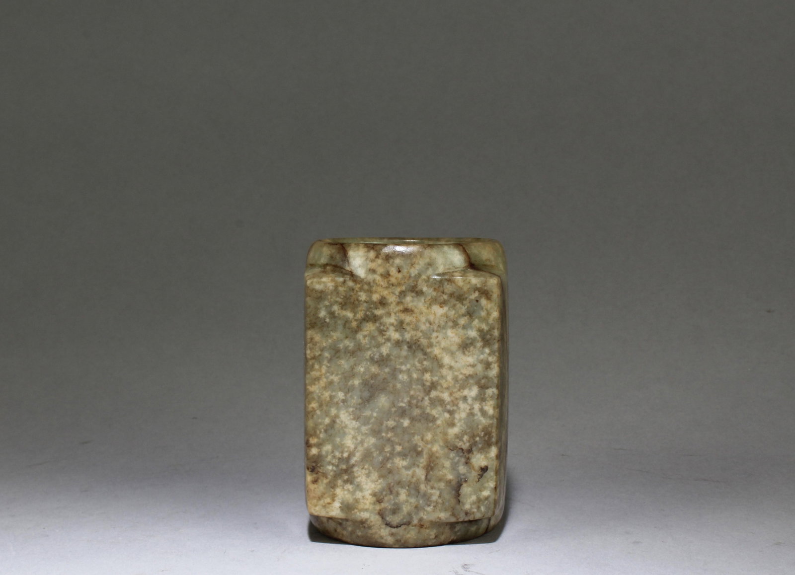 A Carved Jade Cong: A Carved Jade Cong. Dimensions: 3.2" X 2.2"