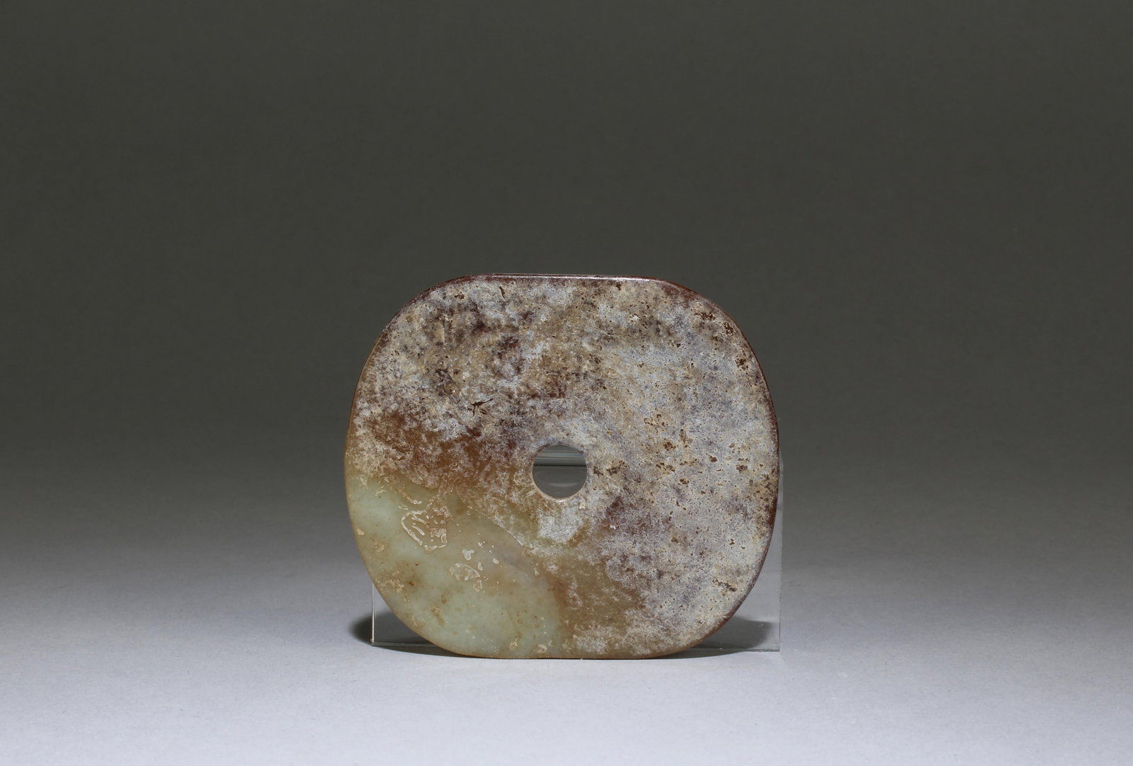 A Jade Bi Disk: A Jade Bi Disk.Dimensions: 3" X 2.75"