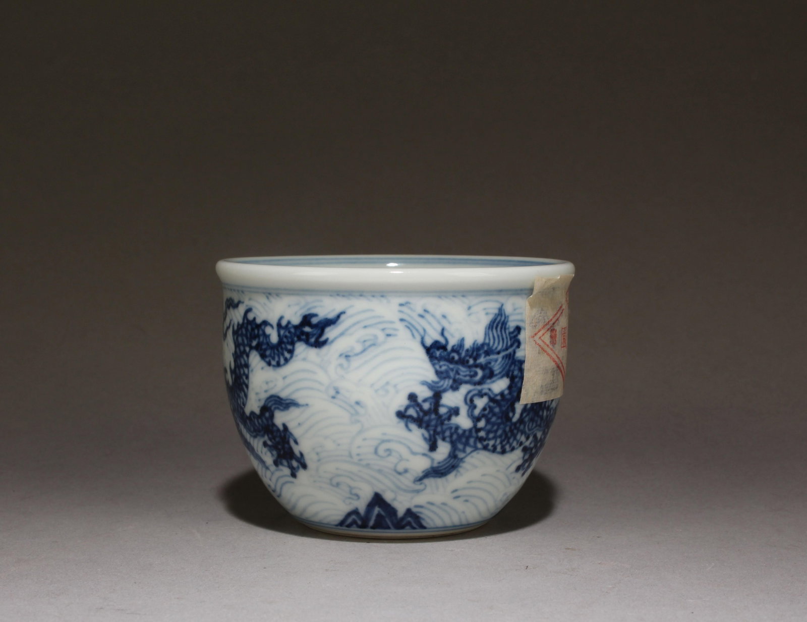 A Blue & White Porcelain Cup: A Blue & White Porcelain Cup. Dimensions: 3" x 2.1"