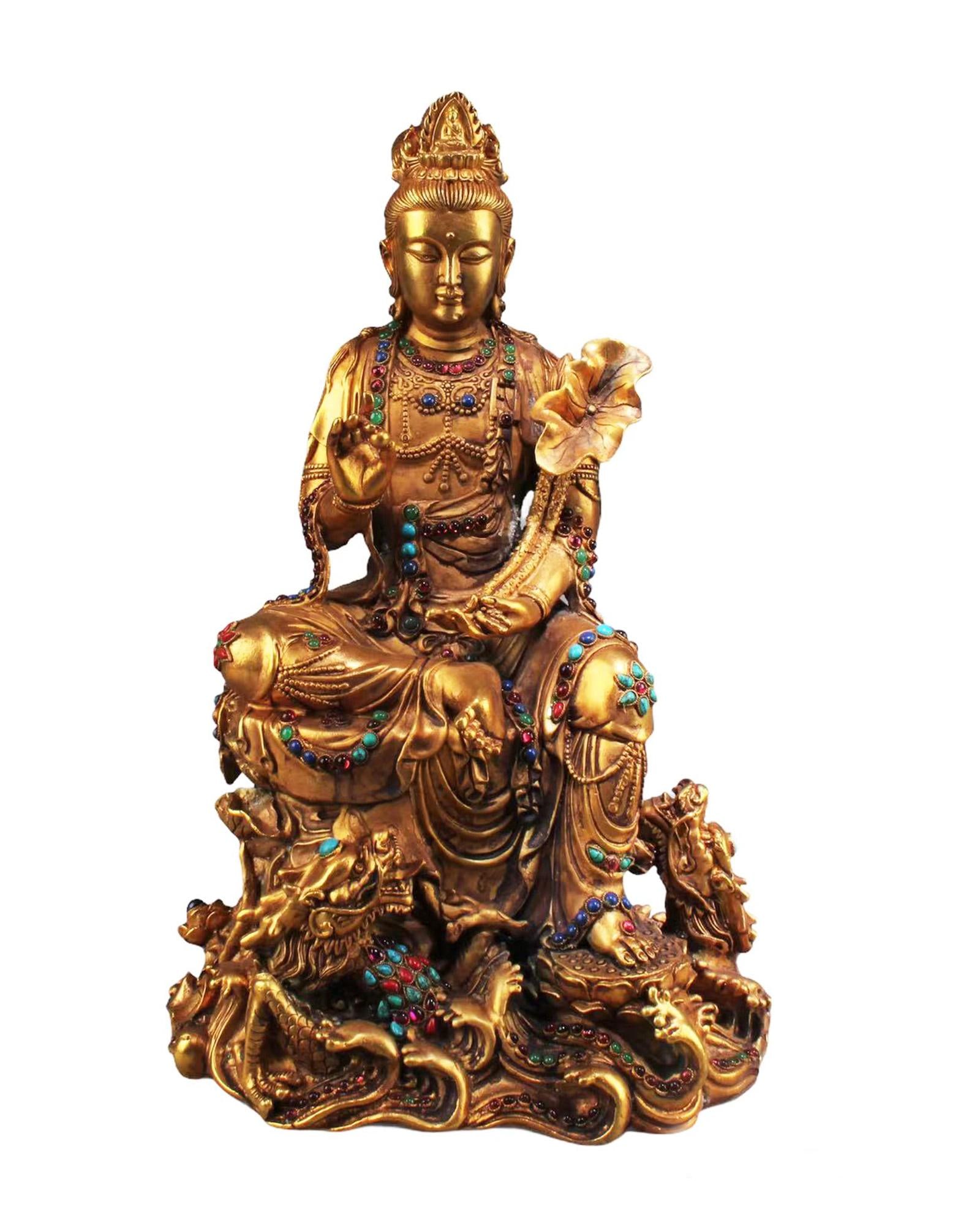 A Gilt Bronze Bodhisittva Statue: A Gilt Bronze Bodhisittva Statue, body decorated with semi precious stone. 'QianLong' mark. Height: 14.5"