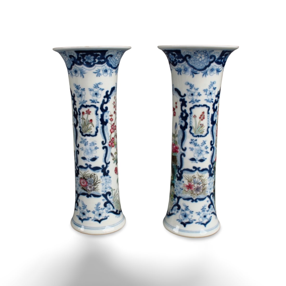 A Pair of Chinese Porcelain Vases: A Pair of Chinese Porcelain Vases. 'XuanTong' at base. Height: 8"