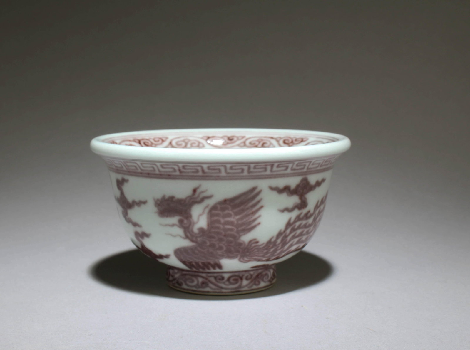 A Red Underglazed Cup: A Red Underglazed Cup. "XuanDe" mark at base. Dimensions: 3.7" x 2"