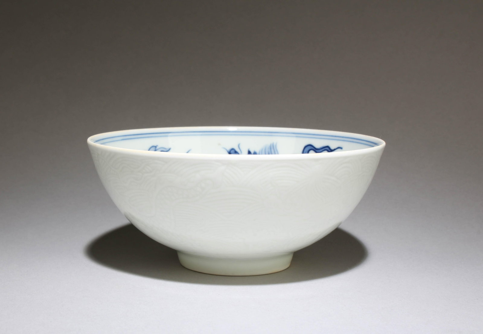 A Blue and White Bowl: A Blue and White Bowl. "ChengHua" mark at base. Dimensions: 4.75" x 2"