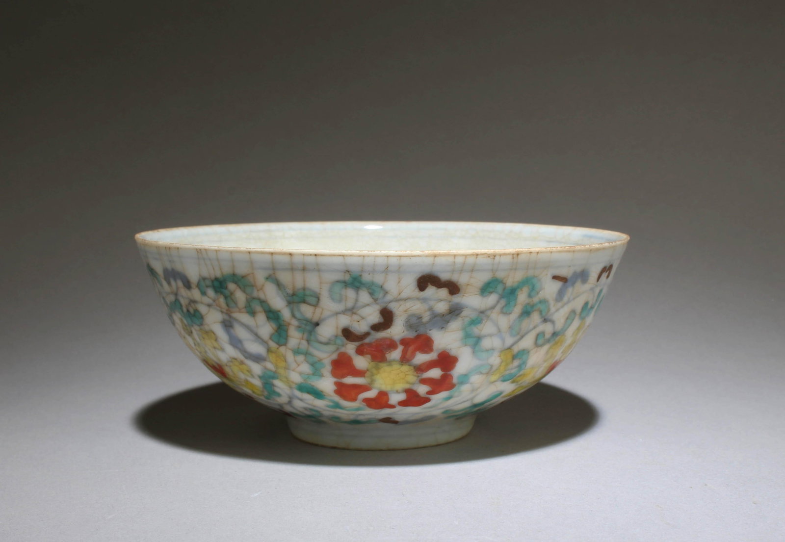 A Doucai Bowl with Flower Motif: A Doucai Bowl with Flower Motif. Dimensions: 5" x 2"