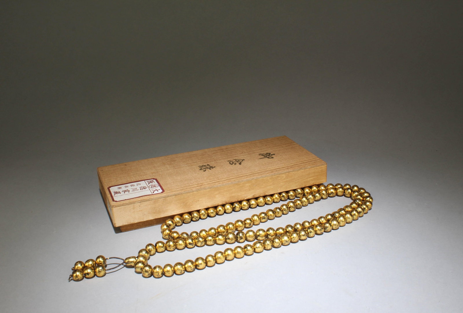 An Agarwood Necklace: An Agarwood Necklace. Bead Diameter: 0.3". Length: 20.5"