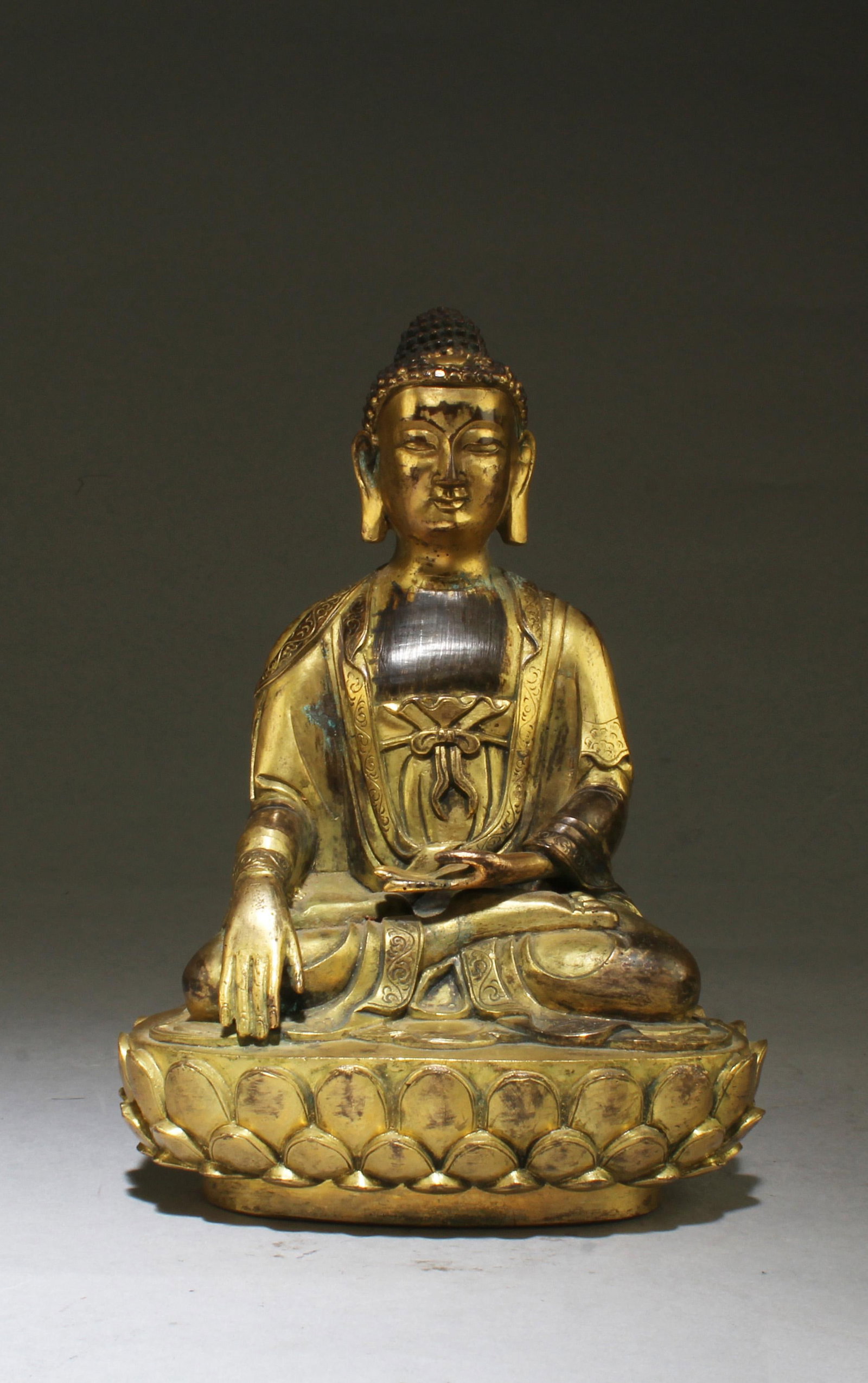 A Gilt Bronze Seated Buddha Statue (1 of 5)