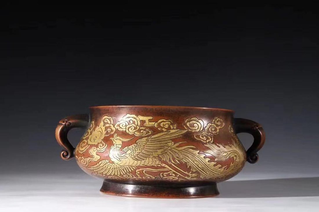 A Gilt Bronze Incense Burner: A Gilt Bronze Incense Burner. 'XuanDe' mark is imprinted at the base. Height: 3.75" Length: 10"