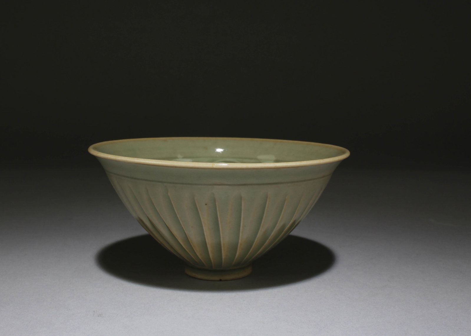 A Yaozhou Ware Bowl: A Yaozhou Ware Bowl. Dimensions: 4.2" x 2"