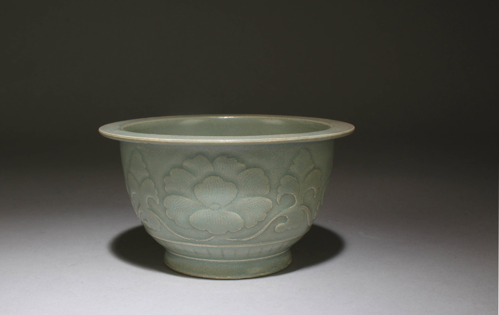 A Longquan Brush Pot with Lotus Motif: A Longquan Brush Pot with Lotus Motif. Dimensions: 3" x 5.5"