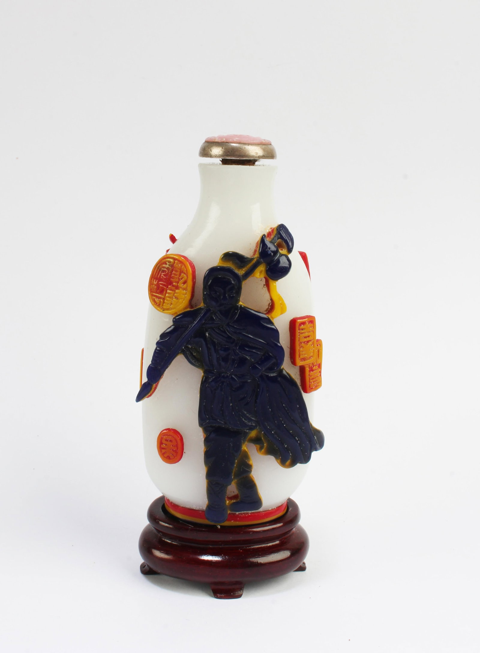 Chinese Peking Glass Snuff Bottle: Chinese Peking Glass Snuff Bottle. Comes fitted with a wooden stand. Height: 3.25" (with stand)