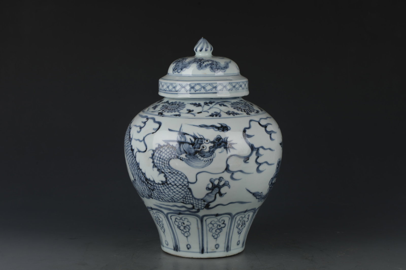 A Blue and White Jar with Lid: A Blue and White Jar with Lid. Dimensions: 12" x 9".