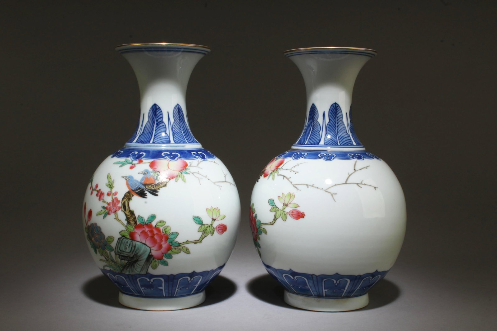 A Set of Two Fencai Vases: A Set of Two Fencai Vases. Dimensions: 9.5" x 6".