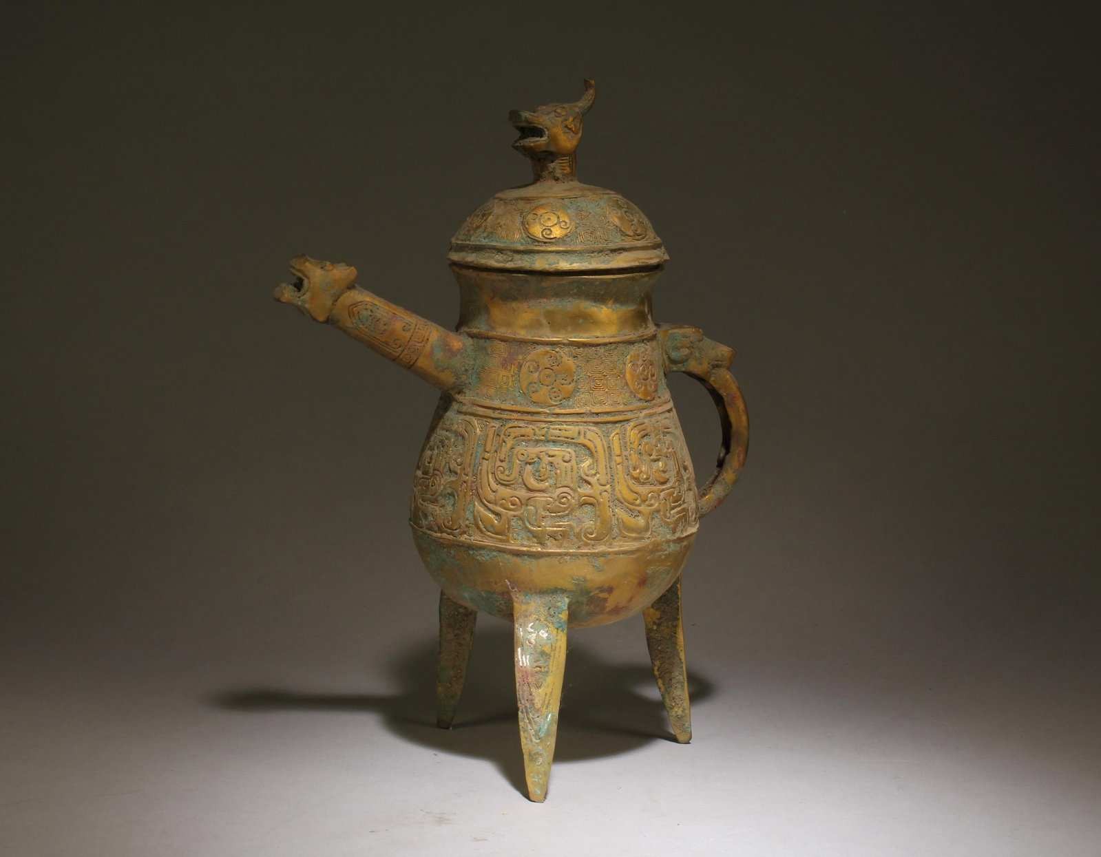 A Chinese Bronze Vessel with Lid: A Chinese Bronze Vessel with Lid. Dimensions: 12" x 9" x 5".