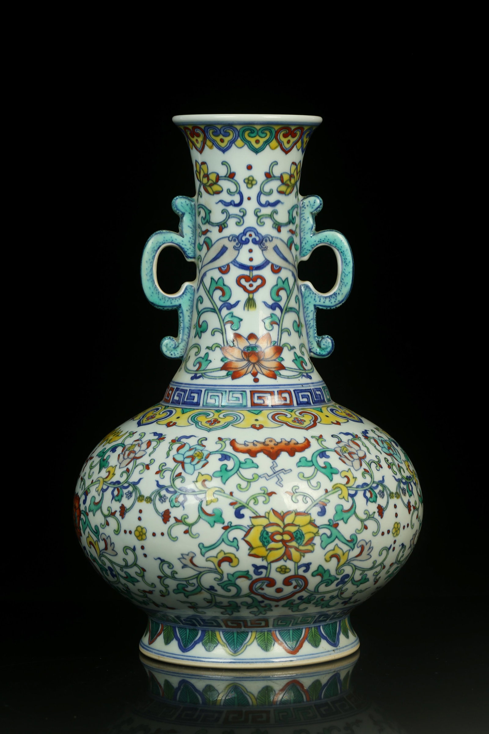 A Famille Verte Porcelain Vase: A Famille Verte Porcelain Vase. 'YongZheng' mark at base. Height: 13in Diameter: 7.9in.
