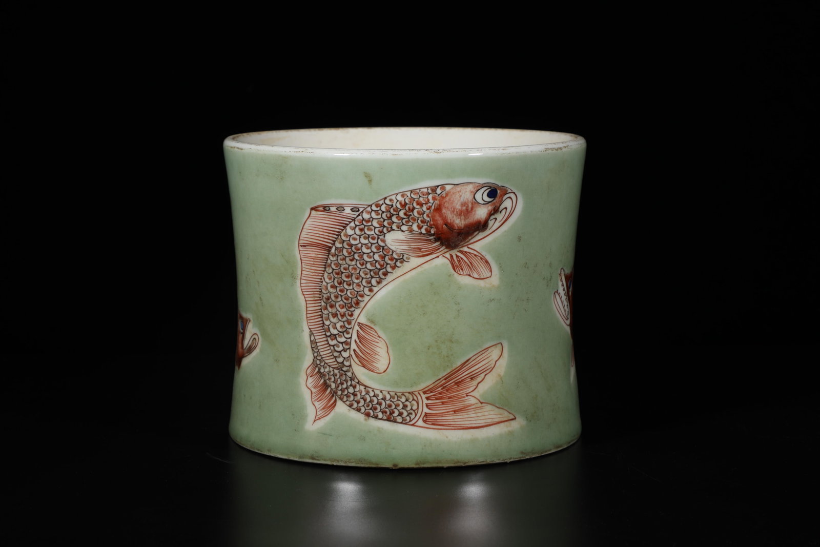 A Porcelain Brushpot: A Porcelain Brushpot. 'KangXi' mark at base. Diameter: 7.5" Height: 6.15"