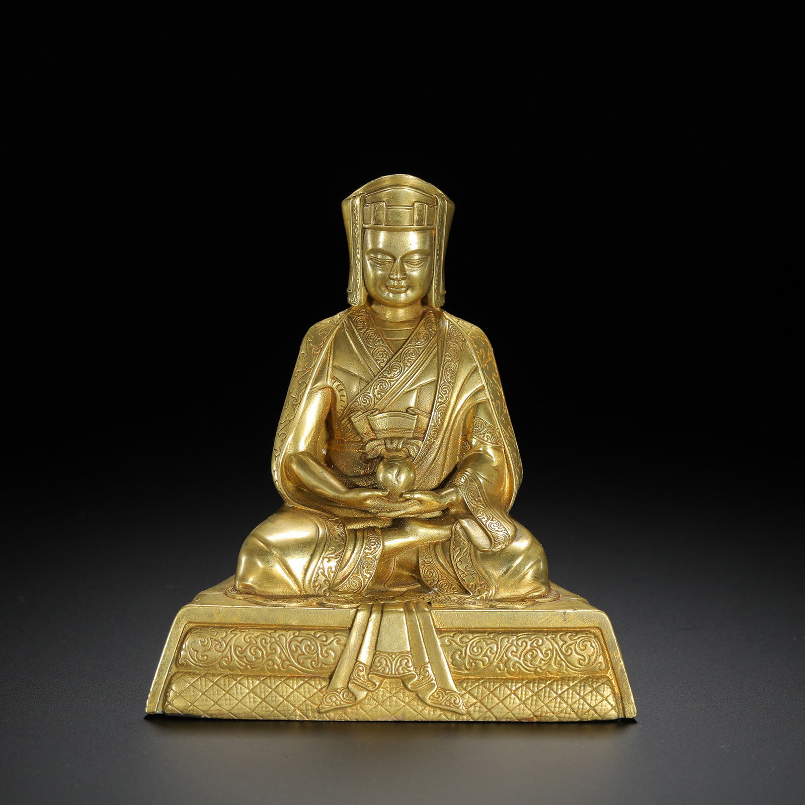 Gilt-Bronze Kagyu Lama Figure: Gilt-Bronze Kagyu Lama Figure. Length: 3.82" Width: 2.36" Height: 4.09"