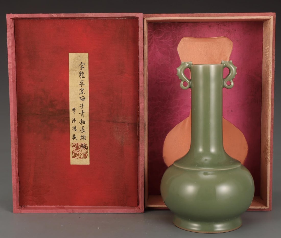 A Longquan Celadon Long-Neck Vase: A Longquan Celadon Long-Neck Vase. A Longquan Celadon Long-Neck Vase. Height: 9.06"; Width: 5.35".