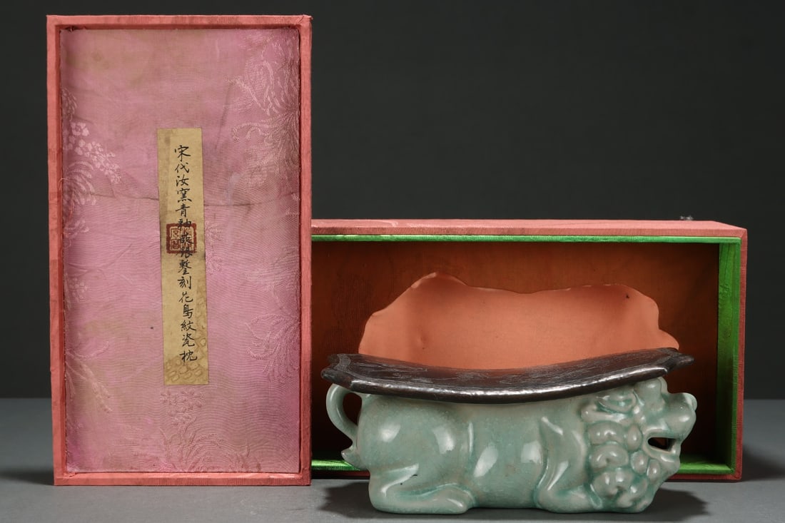 A Ru Ware Celadon Pillow: A Ru Ware Celadon Pillow. Height: 3.94in; Width: 9.17in.