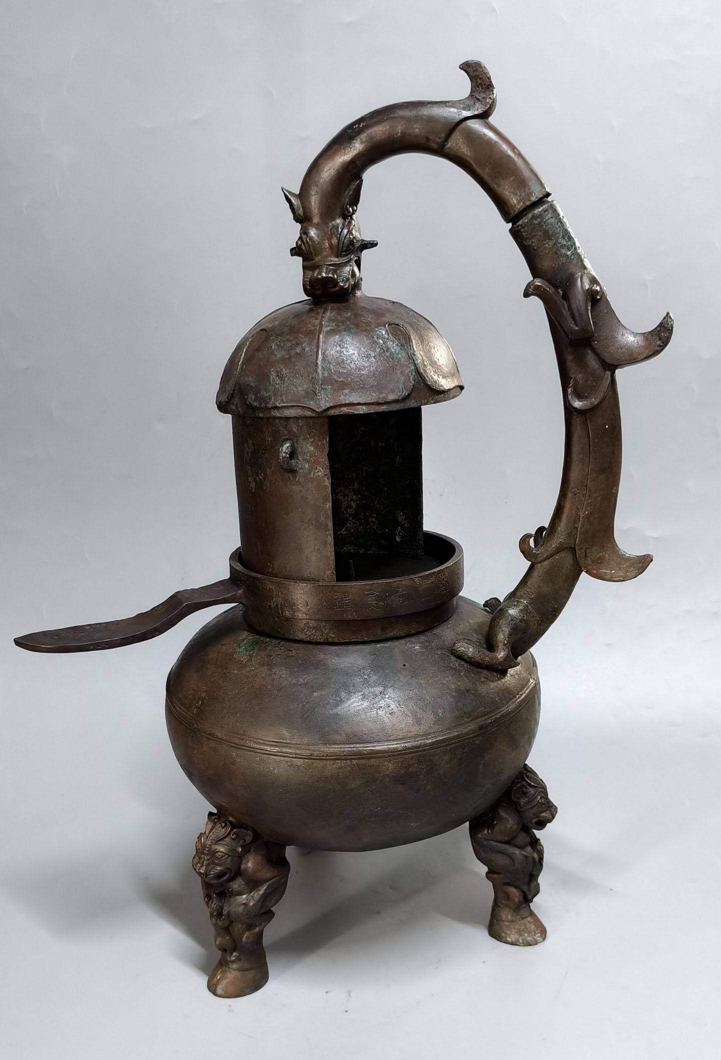 A Bronze Fitting: A Bronze Fitting. Length: 7.87in; Width: 11.42in; Height: 18.11in; Weight: 26.45lb.