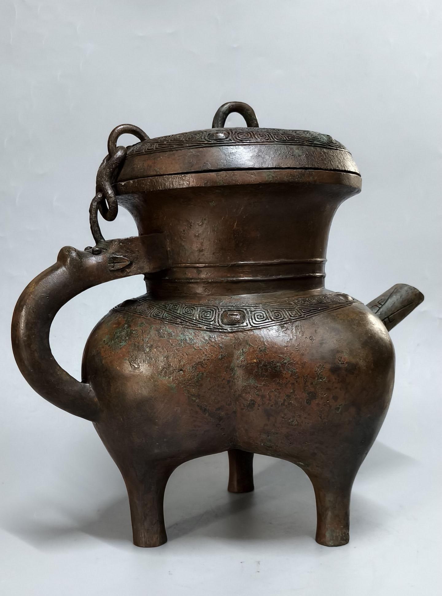 A Bronze He Vessel: A Bronze He Vessel. Length: 13.39in; Width: 8.66in; Height: 12.99in; Weight: 28.66lb.
