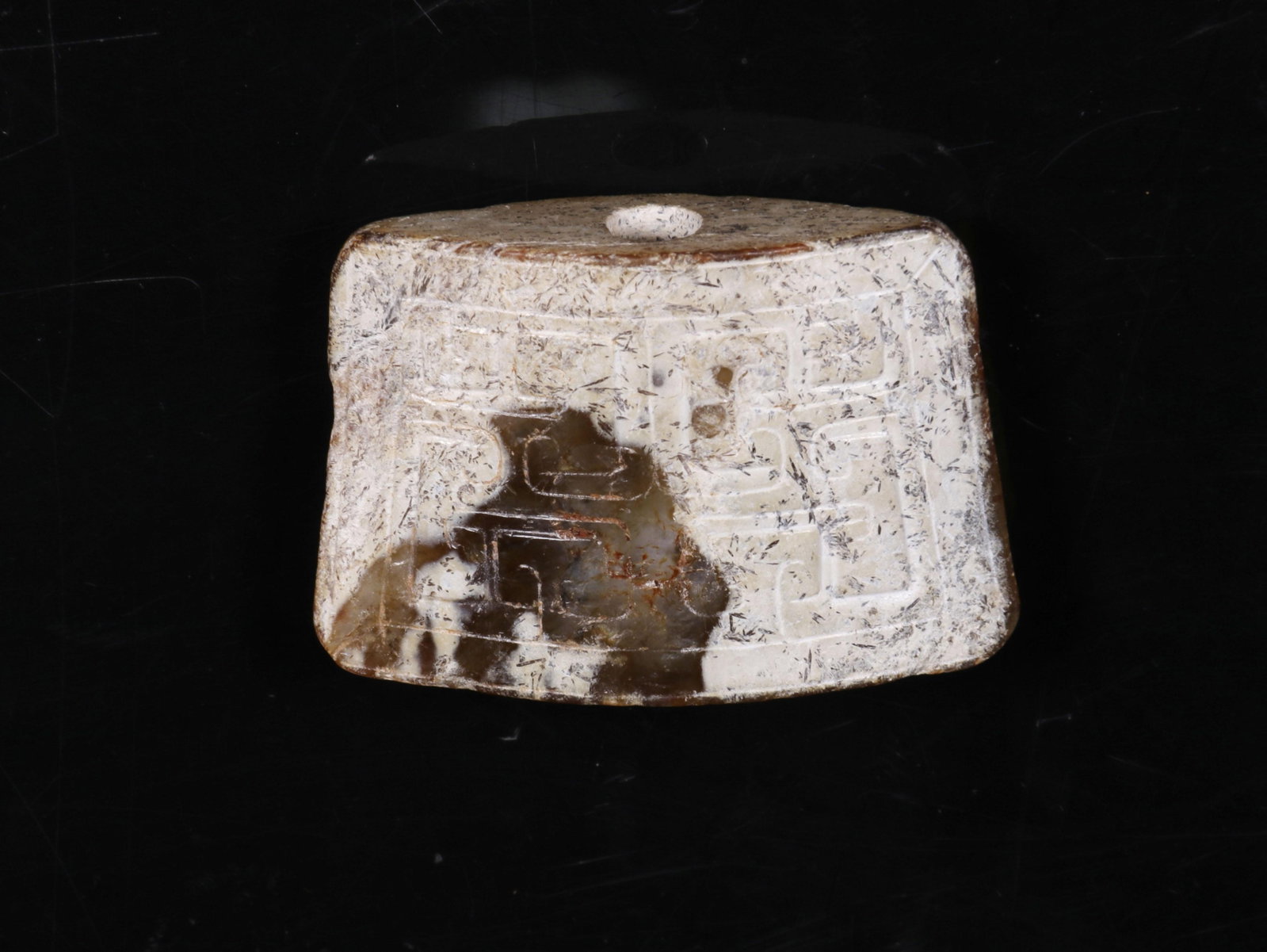 A Bronze Sword Fitting: A Bronze Sword Fitting. Length: 1.93in; Width: 1.30in; Thickness: 0.59in.