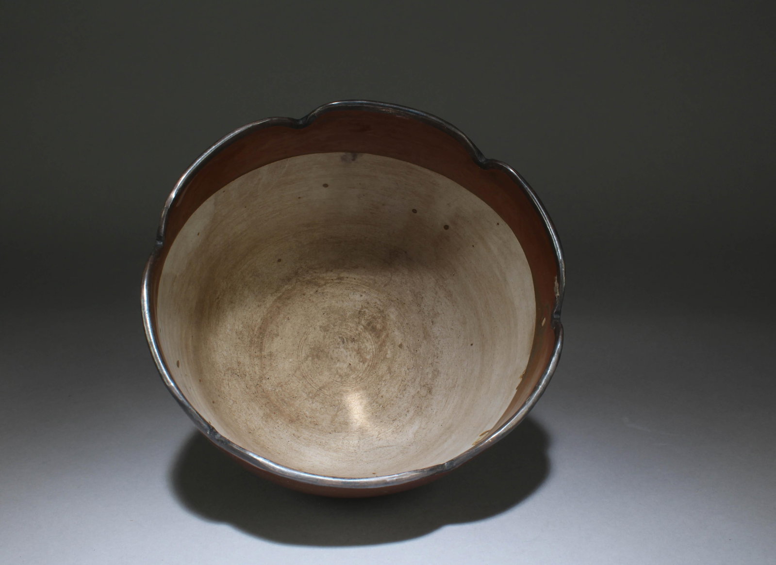 A Dingyao Bowl: A Dingyao Bowl. Dimensions: 4" x 6.5"