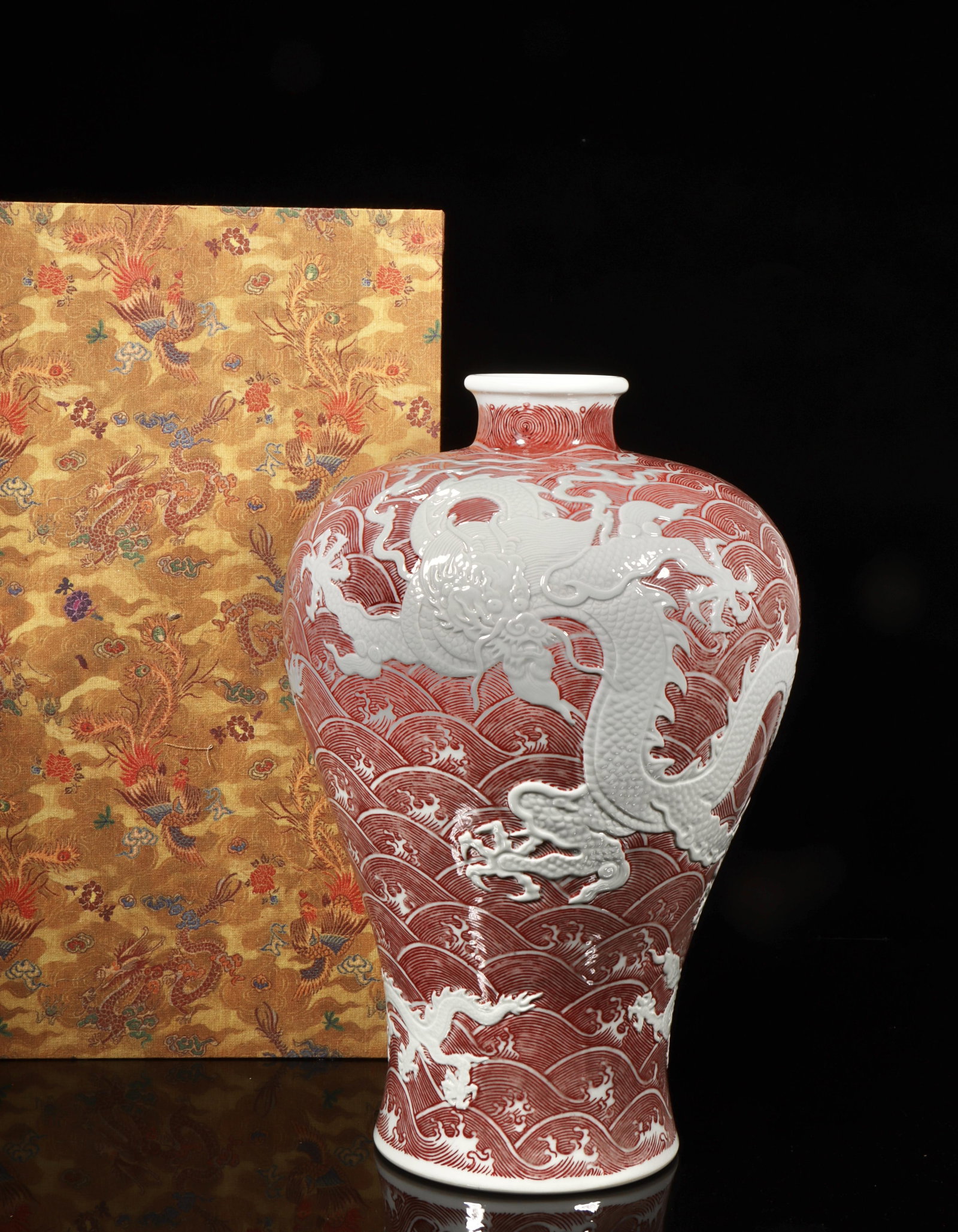 A Red Underglazed Meiping Vase with Dragon Motif: A Red Underglazed Meiping Vase with Dragon Motif. Height: 13.98in; Diameter: 9.65in.