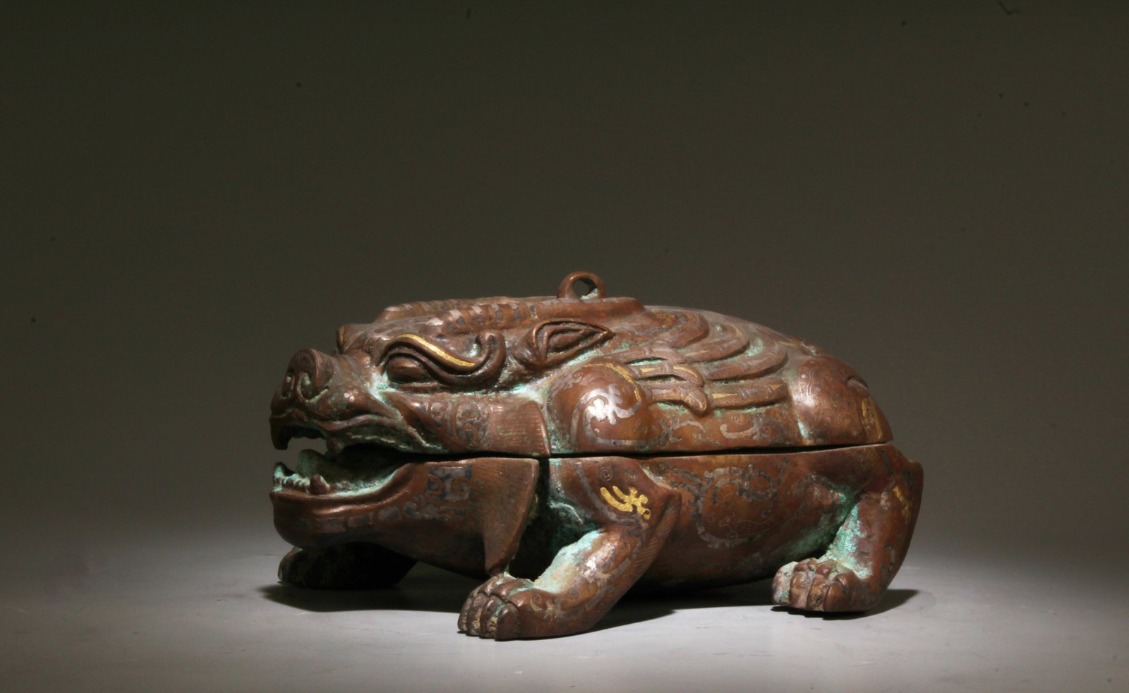A Bronze Mythical Beast Figurine: A Bronze Mythical Beast Figurine. Dimension: 10" x 6 x 5".