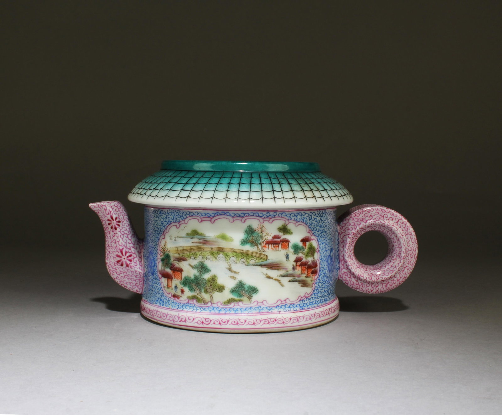 A Fencai Teapot: A Fencai Teapot. 'QianLong' mark at base. Height: 3.2" Length: 7"