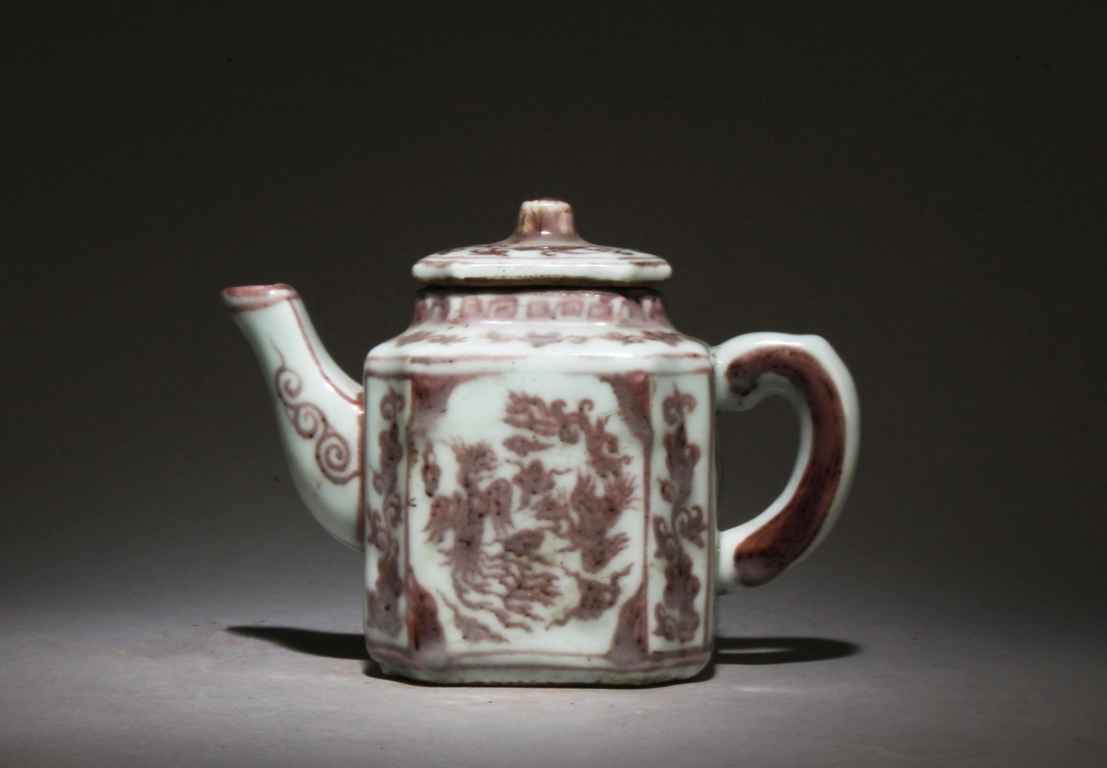 An Underglazed Red Pot: An Underglazed Red Pot. Dimensions: 5" x 6.5" x 3.5".
