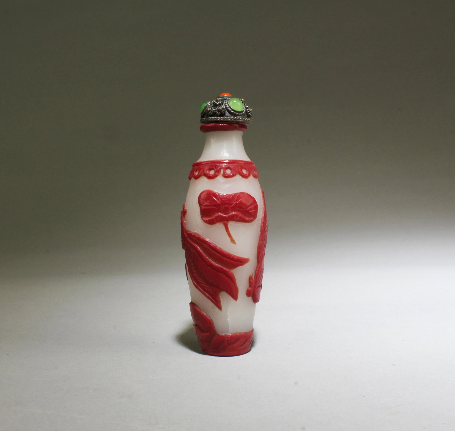 A Peking Glass Snuff Bottle: A Peking Glass Snuff Bottle. Height: 3.3"