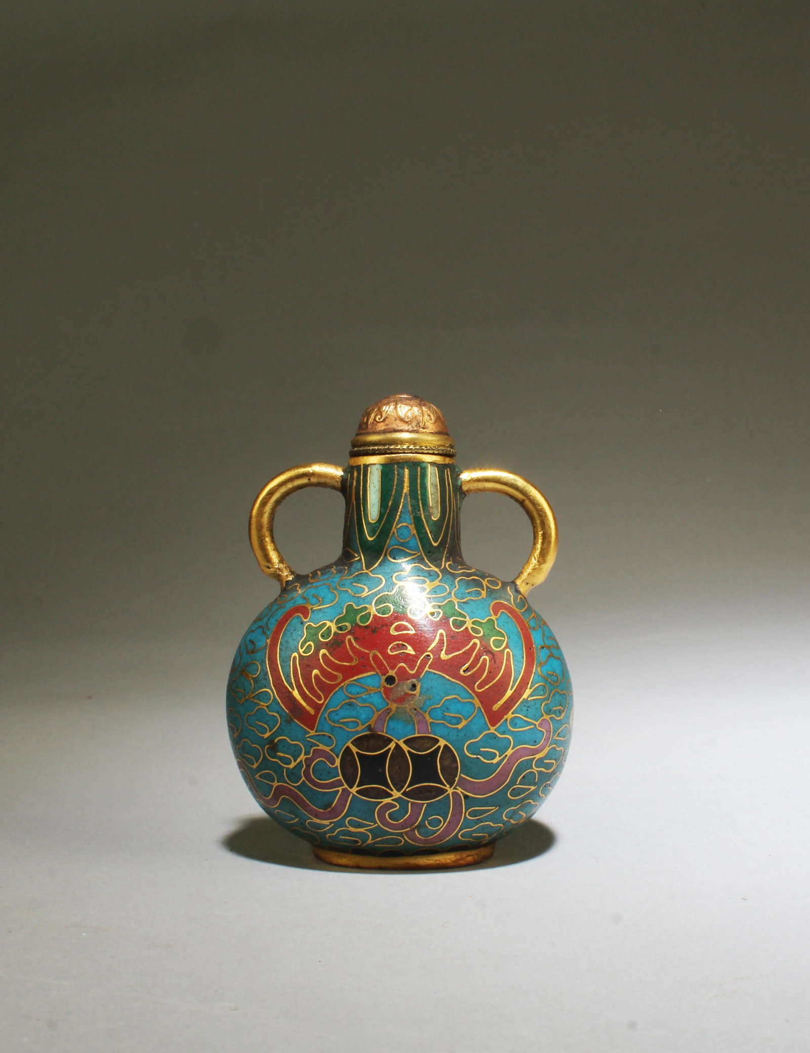 A Cloisonne Snuff Bottle: A Cloisonne Snuff Bottle. 'QianLong' mark. Height: 2.75"