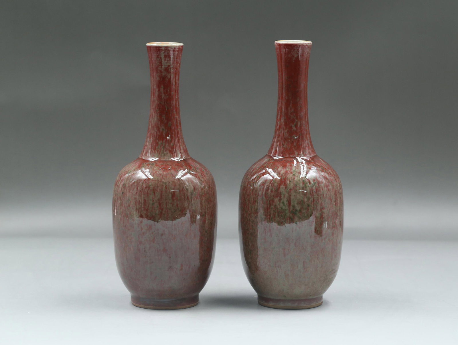 A Pair of Chinese Peach Blossom Vases: A Pair of Chinese Peach Blossom Vases. Height: 8.66"