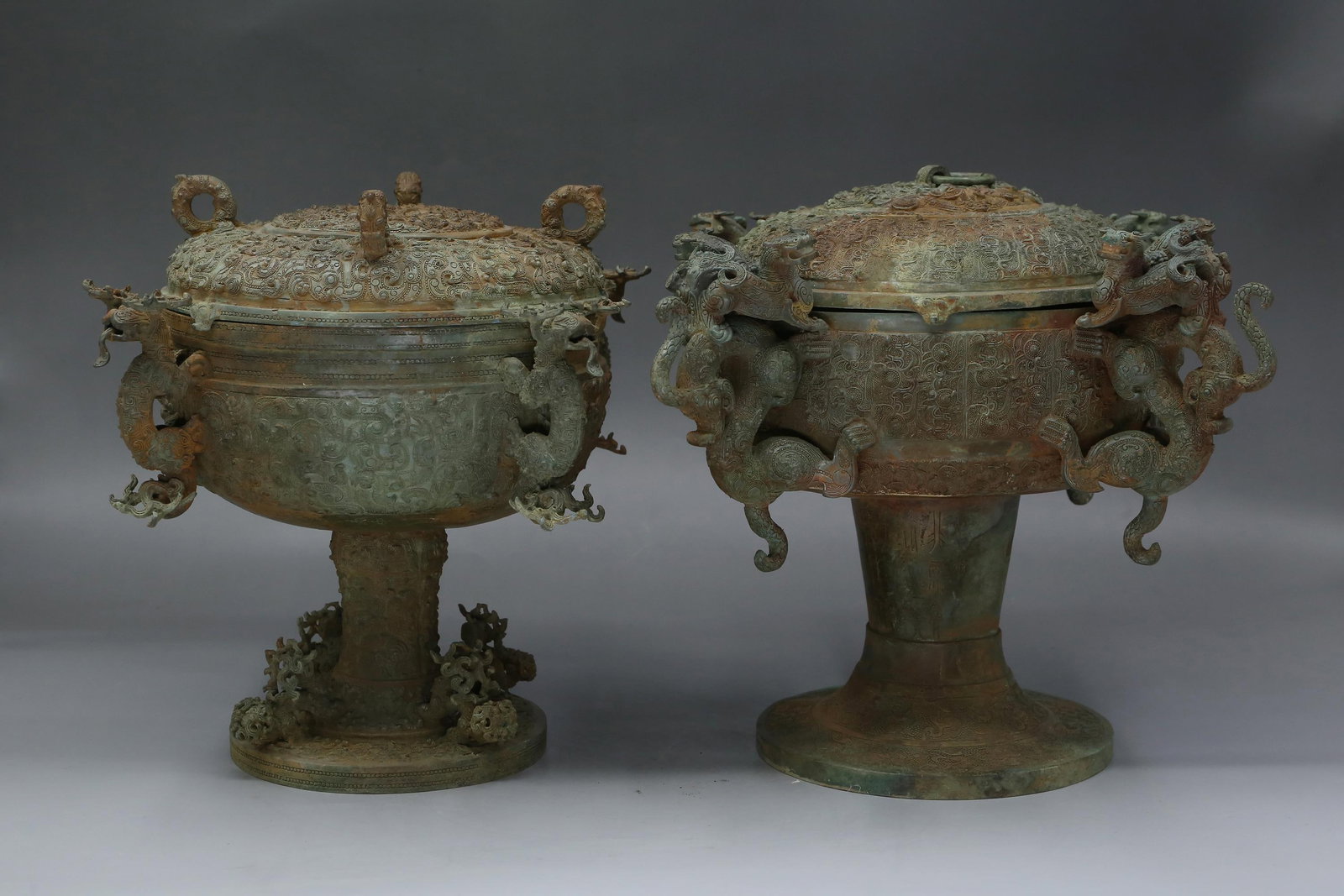 A Group of Two Bronze Containers: A Group of Two Bronze Containers. Height: 10" Length: 9.5" , 10.5". Weight: 15.98 lb (total)Provenance: From an estate sale in Beverly Hill, California.