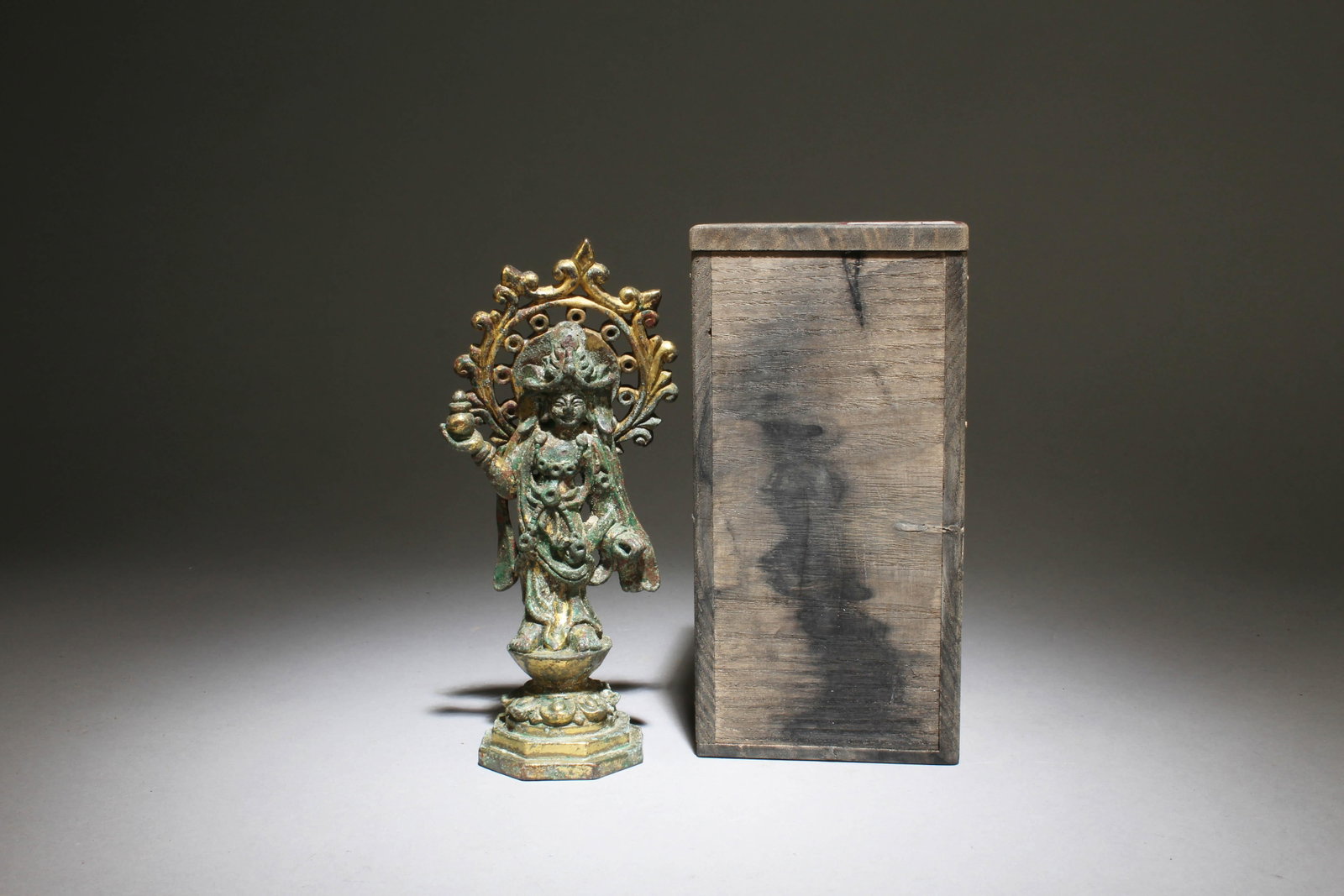 A Gilt-Bronze Standing Buddha: A Gilt-Bronze Standing Buddha. Dimensions: 6.5" x 3.2".