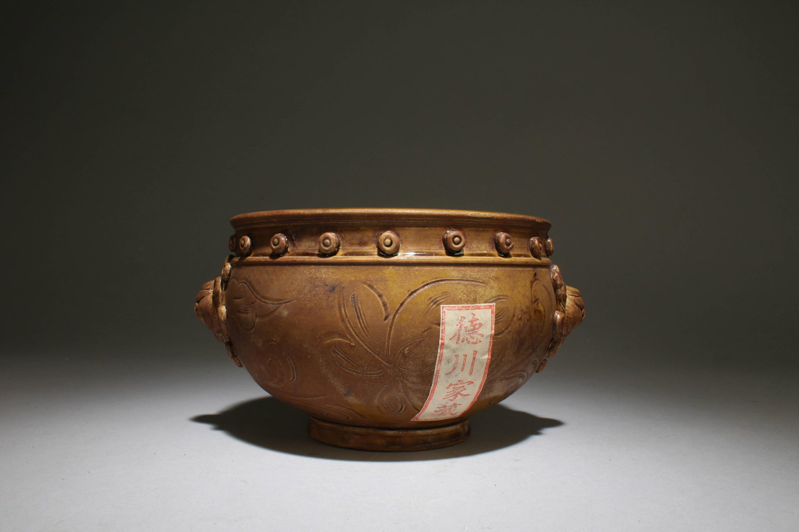 A Double-Eared Dingyao Incense Burner: A Double-Eared Dingyao Incense Burner. Dimensions: 7.5" x 4".