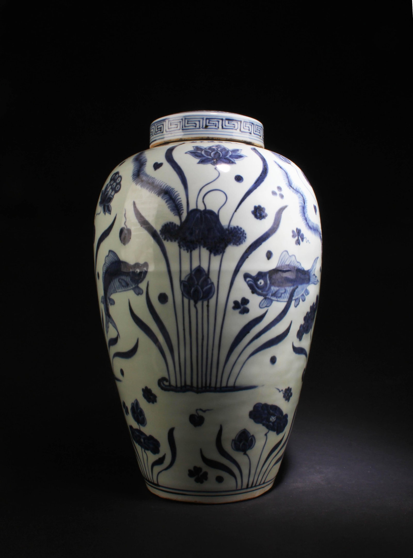 A Blue & White Porcelain Jar: A Blue & White Porcelain Jar with lid. 'XuanDe' mark. Height: 16.25"