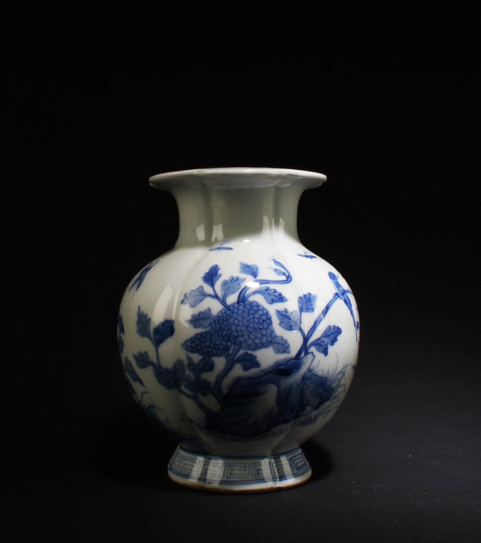 A Blue & White Porcelain Vase: A Blue & White Porcelain Vase. 'KangXi' mark at base. Height: 7.5" Diameter: 6.5"