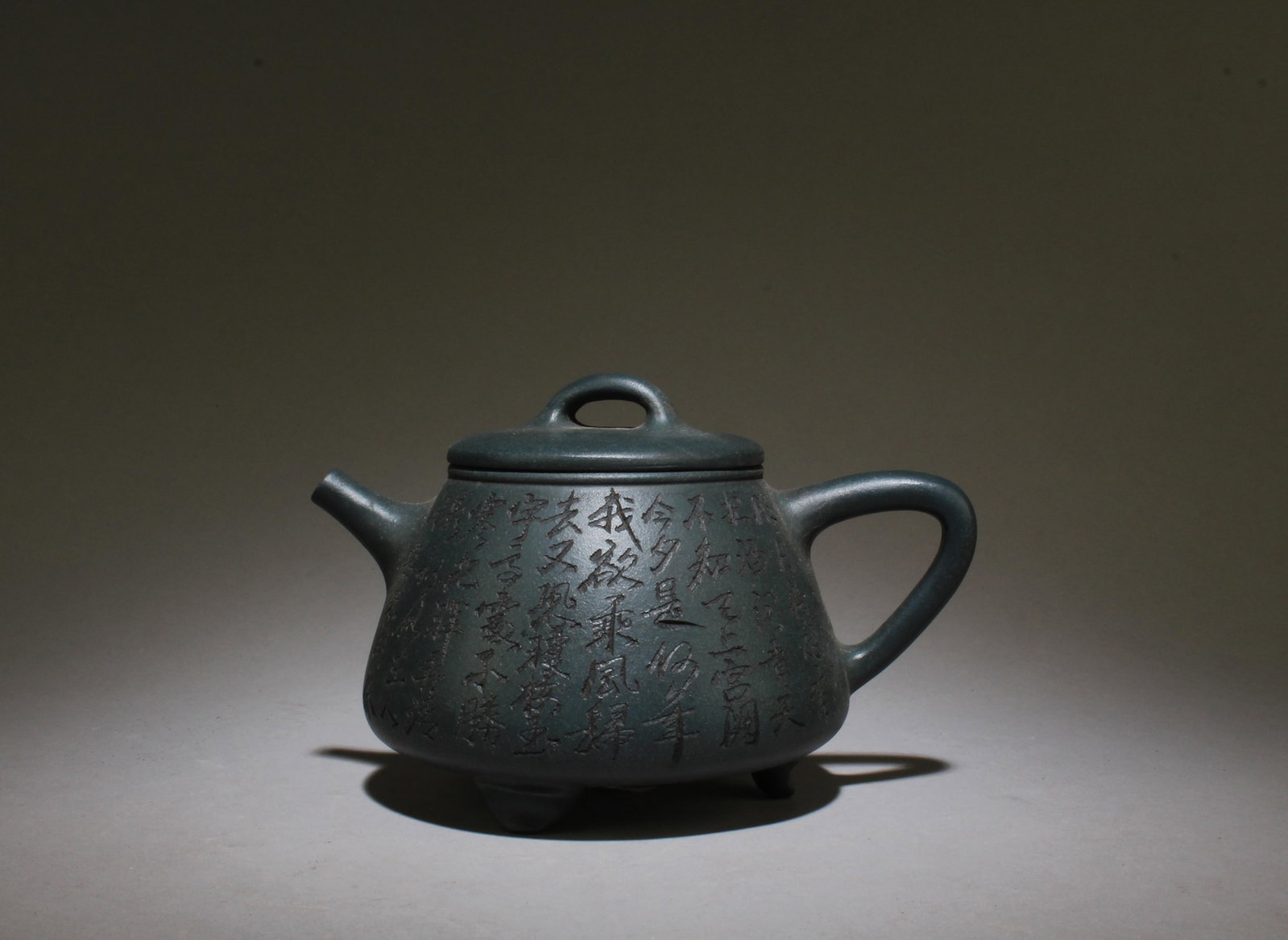 A Zisha Teapot: A Zisha Teapot. Dimensions: 6.5" x 4.1".
